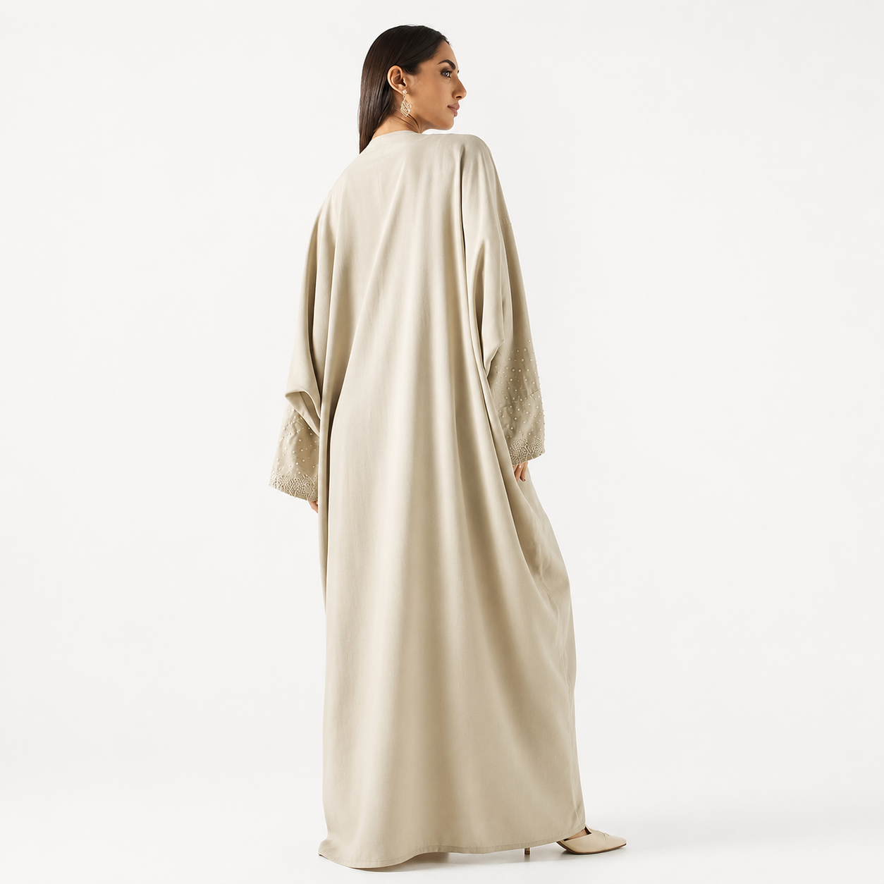 Back view of beige pearl-embellished bisht abaya