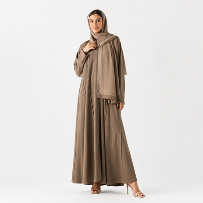 Beige abaya styled for daily and evening wear
