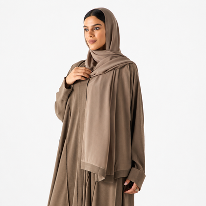 Side view of beige long sleeve flowing abaya