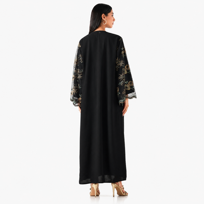 Back view of black flowing abaya with lace detailing