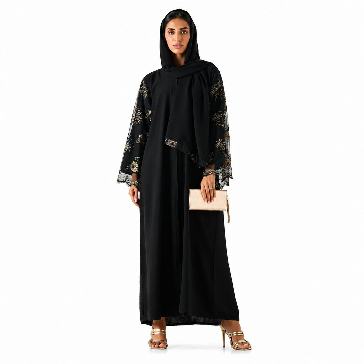 Woman wearing black embroidered abaya for evening occasion